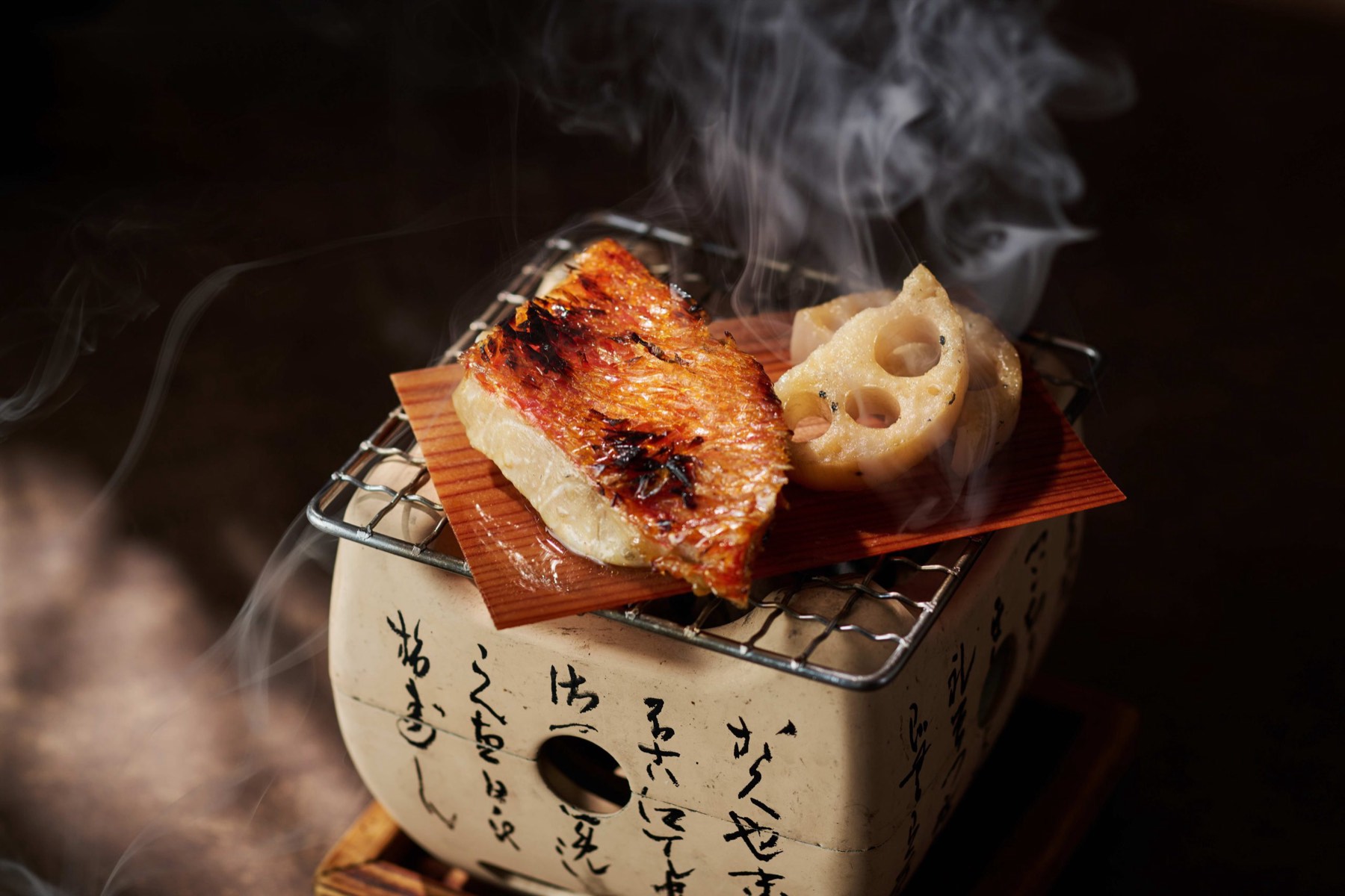 A kaiseki course plated on ceramic