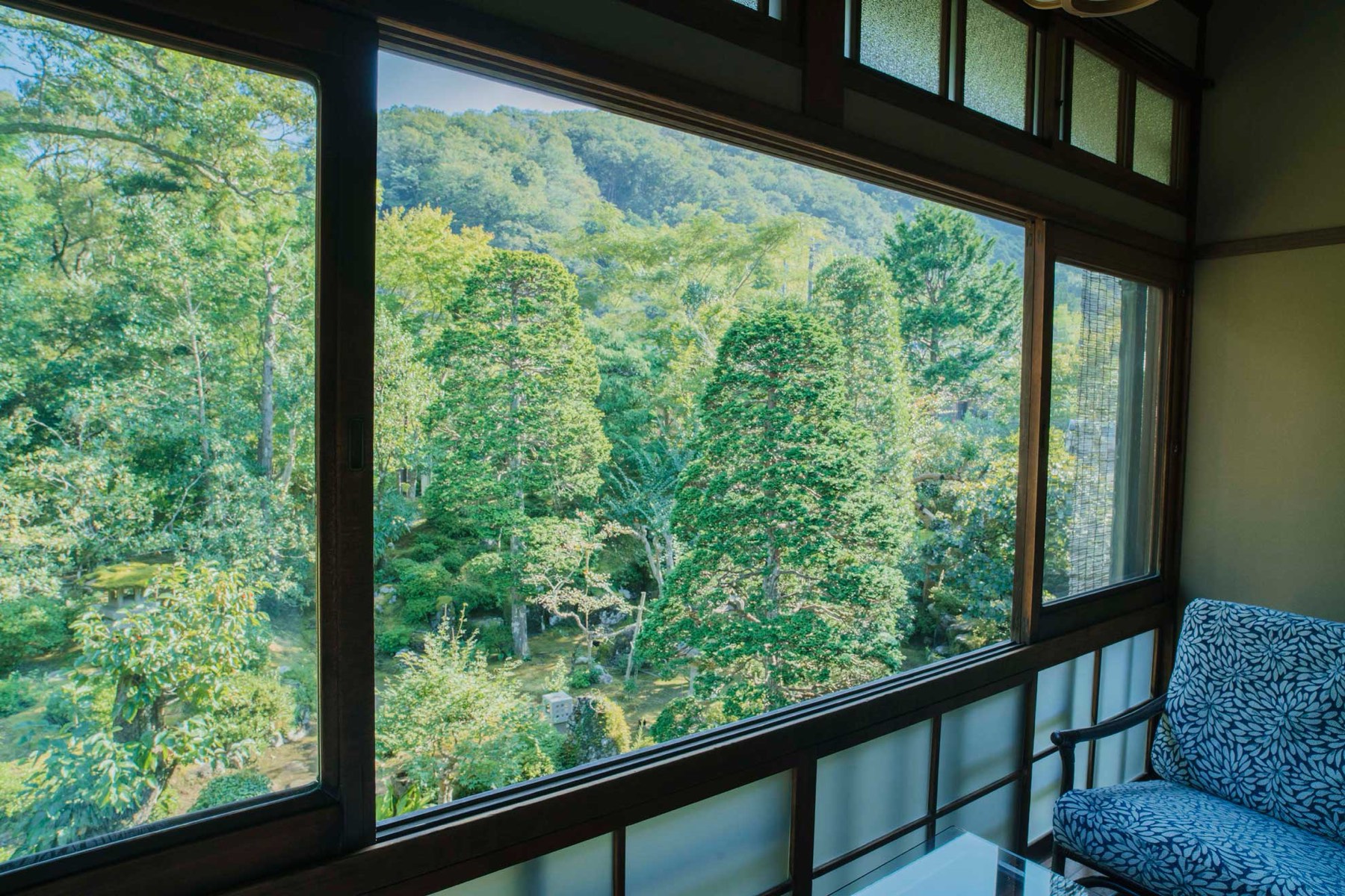 The garden and mountain seen from the room's window seat
